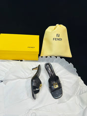 FENDI MEDIUM-HEELED 55 MM MULE IN BLACK LAMBSKIN WITH GOLD HARDWARE