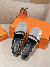 INFINIE 50 PUMP BLACK AND WHITE LAMBSKIN