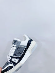 LV TRAINER SNEAKER IN DOVE GRAY MONOGRAM DENIM