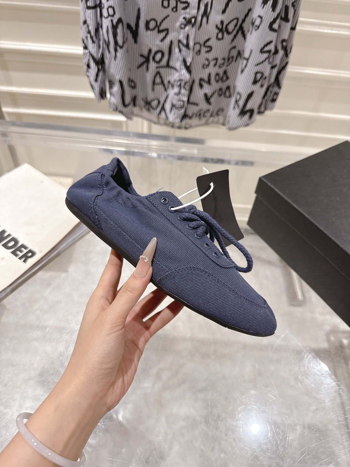 PRADA 26S COLLAPSE SNEAKERS IN BLUE CANVAS