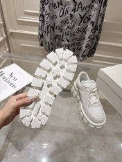 PRADA 26S GEAR SOLE SNEAKERS IN WHITE SUEDE AND MESH