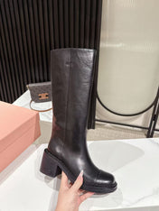 MIUMIU 26S HIGH-ANKLE BOOTS 50MM IN BLACK GLOSSY CALFSKIN