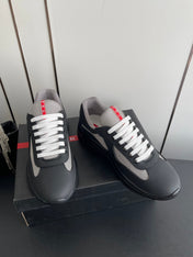 PRADA 26S AMERICA CUP SNEAKERS IN BLACK SOFT RUBBER AND BIKE FABRIC