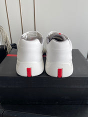 PRADA 26S AMERICA CUP SNEAKERS IN WHITE SOFT RUBBER AND BIKE FABRIC