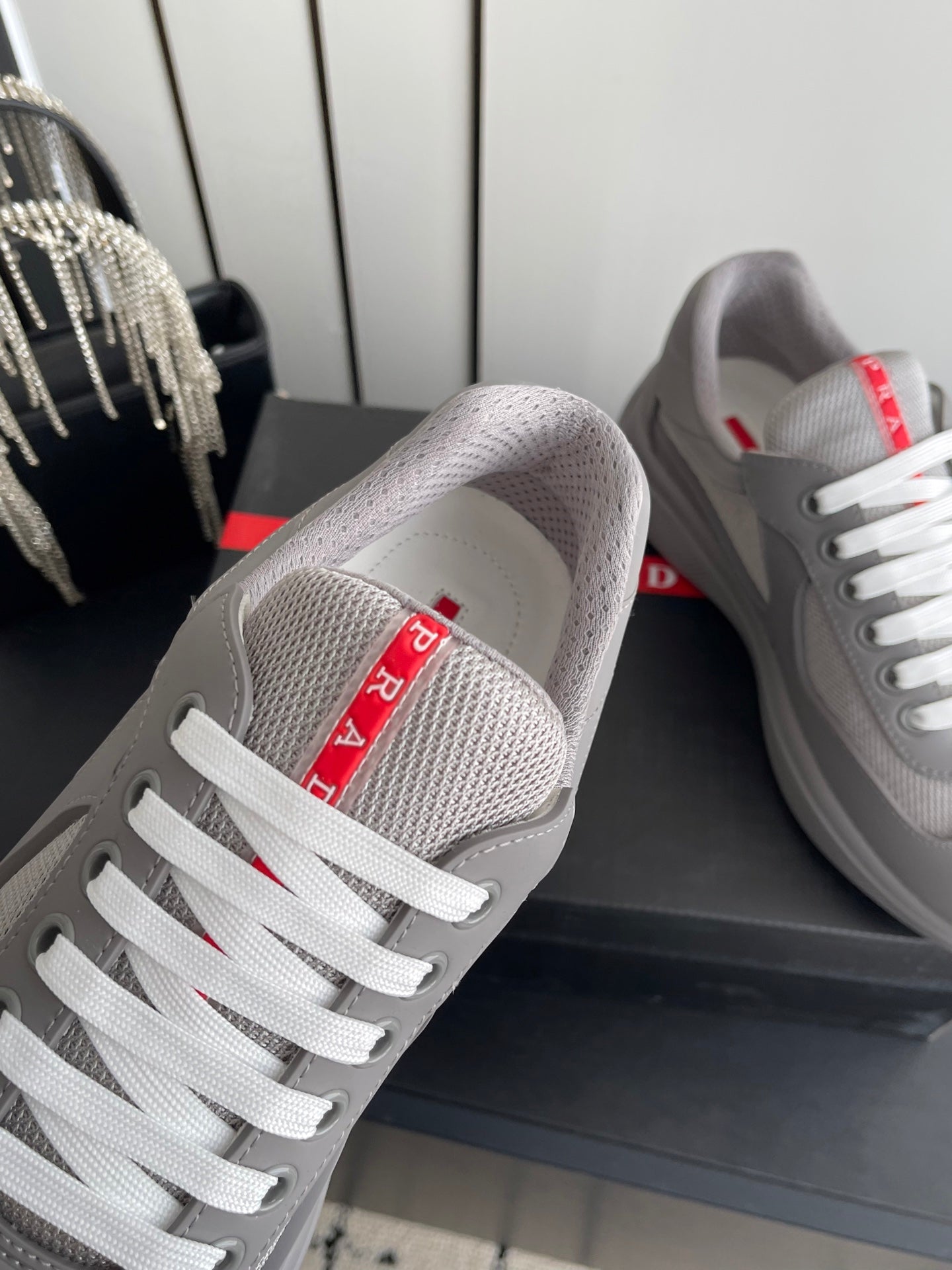 PRADA 26S AMERICA CUP SNEAKERS IN COOL GRAY SOFT RUBBER AND BIKE FABRIC