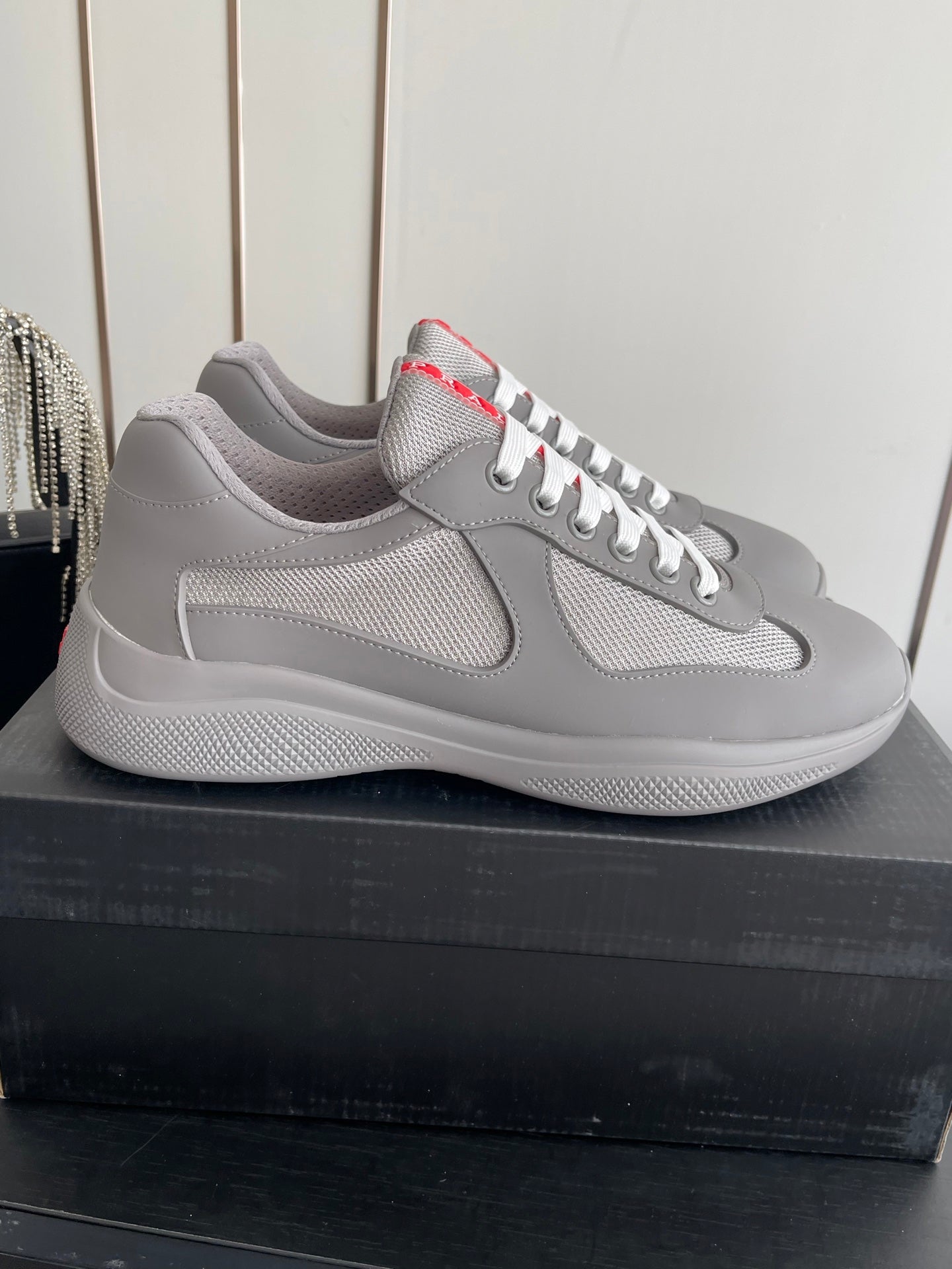 PRADA 26S AMERICA CUP SNEAKERS IN COOL GRAY SOFT RUBBER AND BIKE FABRIC
