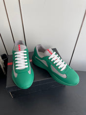 PRADA 26S AMERICA CUP SNEAKERS IN TEAL GREEN SOFT RUBBER AND BIKE FABRIC