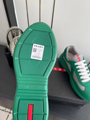 PRADA 26S AMERICA CUP SNEAKERS IN TEAL GREEN SOFT RUBBER AND BIKE FABRIC