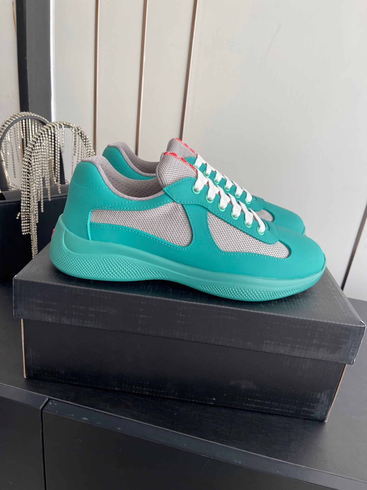 PRADA 26S AMERICA CUP SNEAKERS IN TEAL BLUE SOFT RUBBER AND BIKE FABRIC
