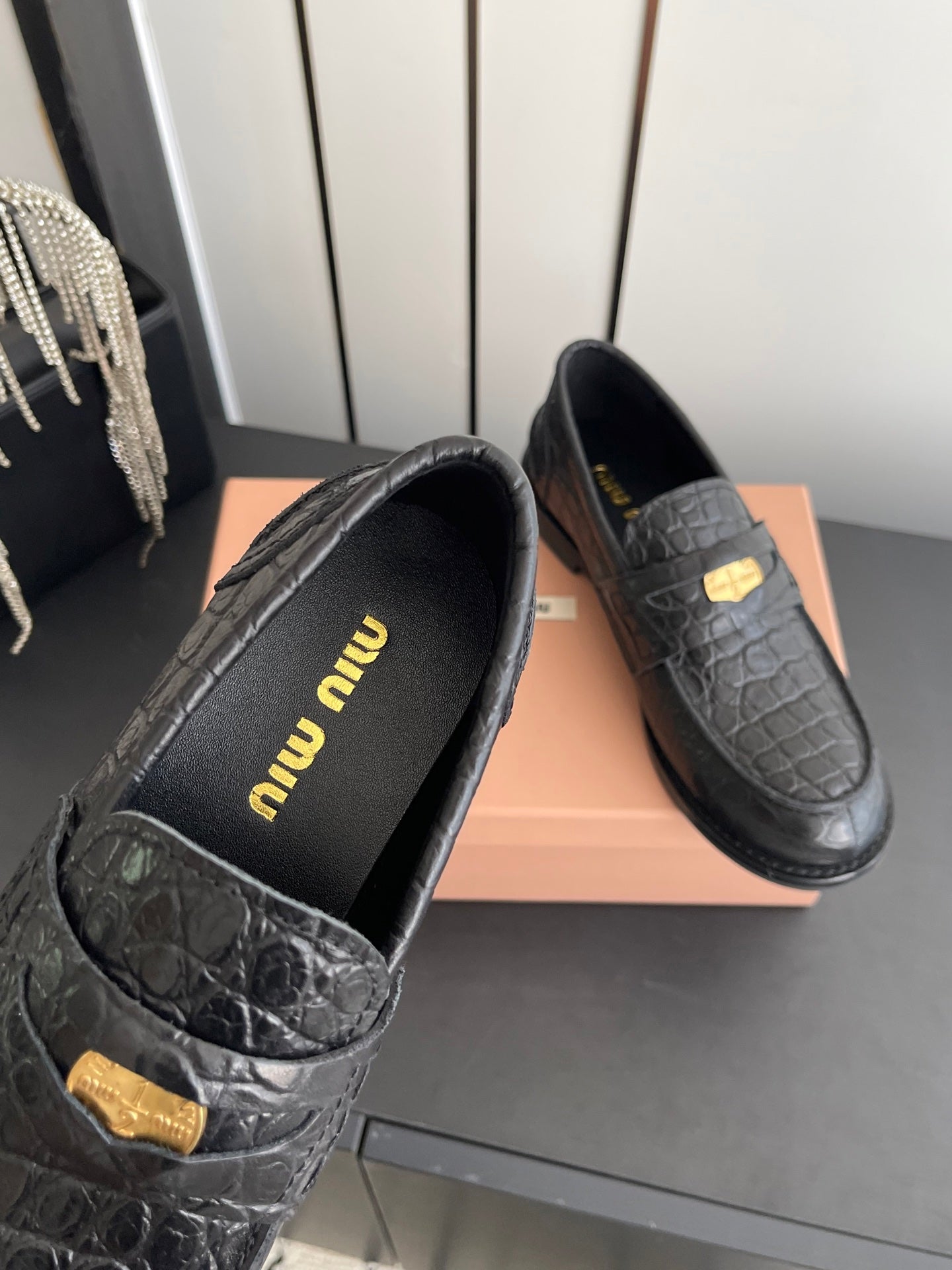 MIUMIU 26S PENNY LOAFERS IN BLACK CALFSKIN CROCODILE EMBOSSING