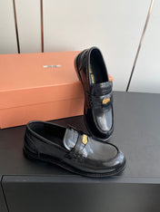 MIUMIU 26S PENNY LOAFERS IN BLACK GLOSSY CALFSKIN GOLD HARDWARE