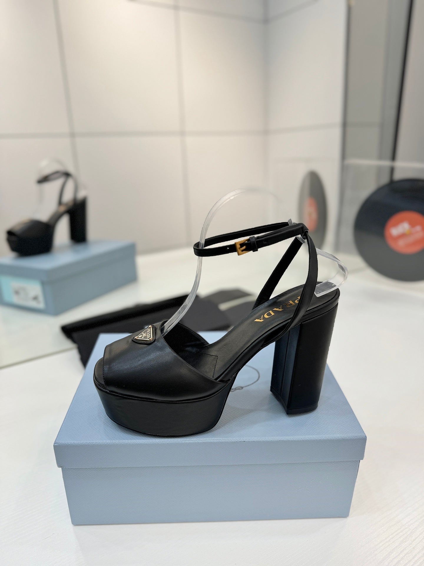 PRADA 26S HEELED SANDALS 115MM IN BLACK CALFSKIN WITH LOGO