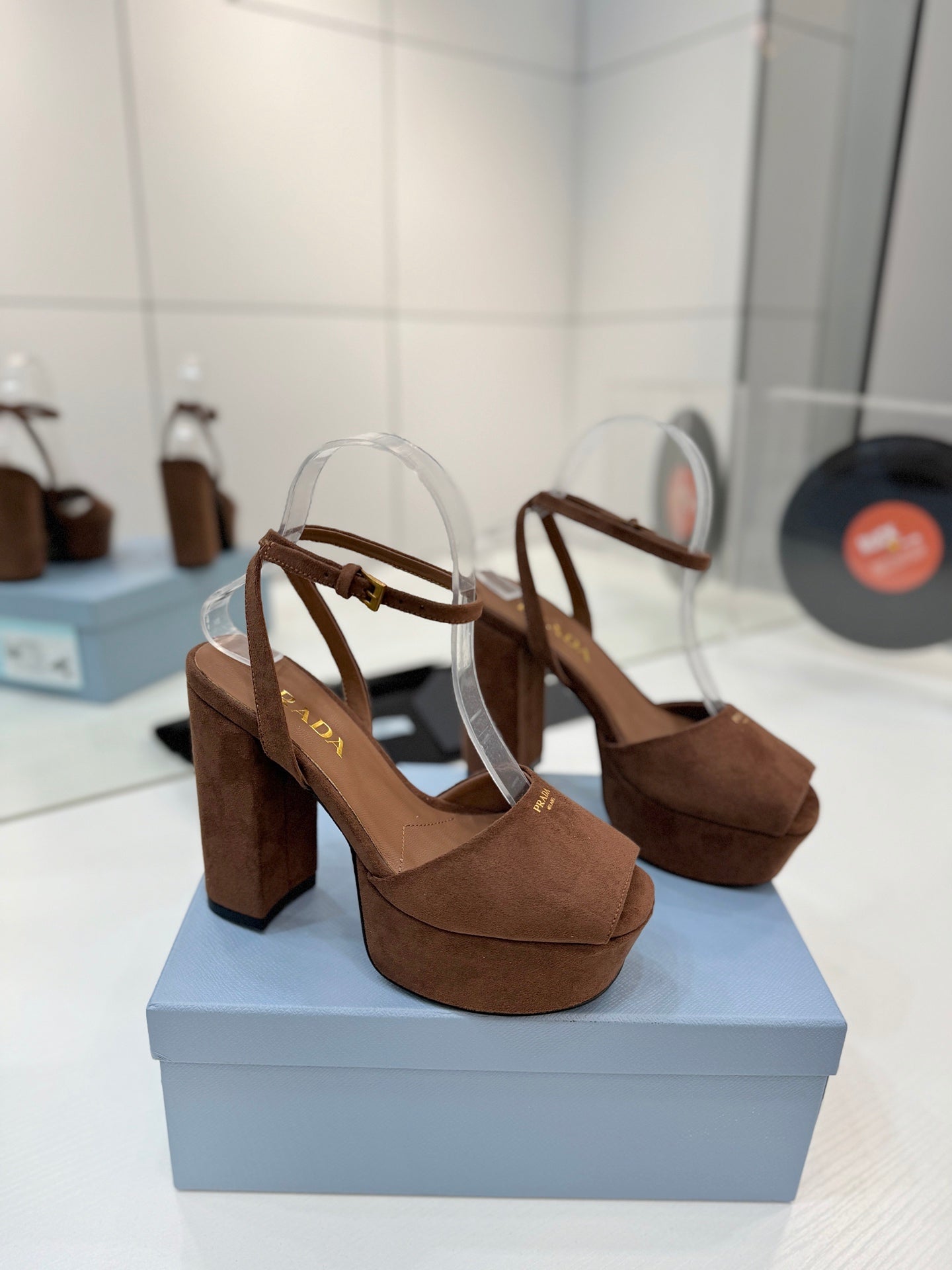 PRADA 26S HEELED SANDALS 115MM IN DARK BROWN SUEDE