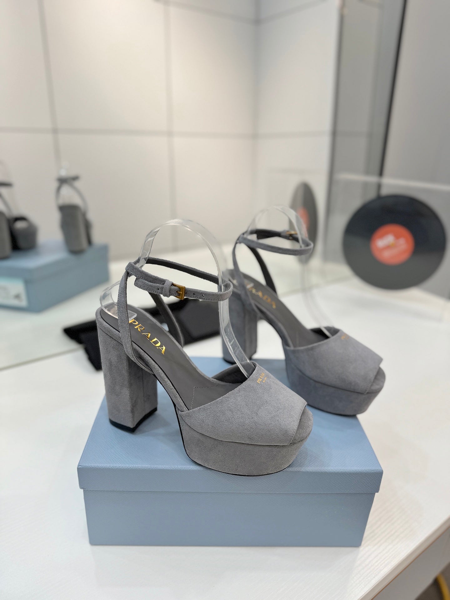 PRADA 26S HEELED SANDALS 115MM IN GRAY SUEDE