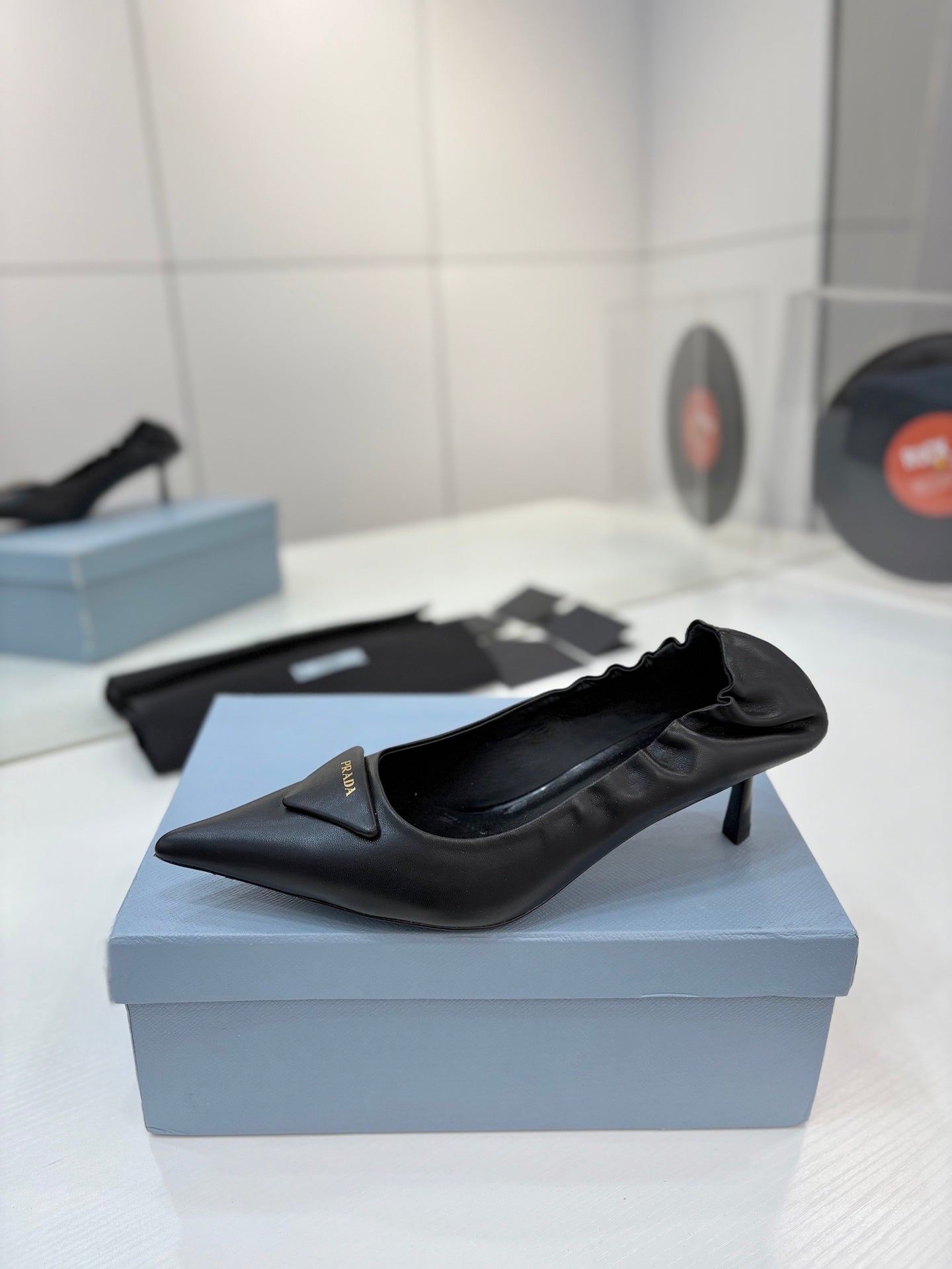 PRADA 26S PUMPS 55MM IN BLACK CALFSKIN WITH LOGO