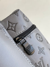 DISCOVERY BACKPACK 38 IN GREY MONOGRAM ECLIPSE CANVAS AND TAURILLON