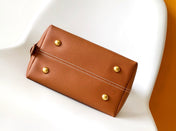 LV 25S LOW KEY HOBO BAG 28 CM IN BURNT ORANGE CALFSKIN