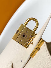 LV 25S LOW KEY HOBO BAG 35 CM IN CREAM WHITE CALFSKIN