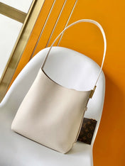LV 25S LOW KEY HOBO BAG 35 CM IN CREAM WHITE CALFSKIN