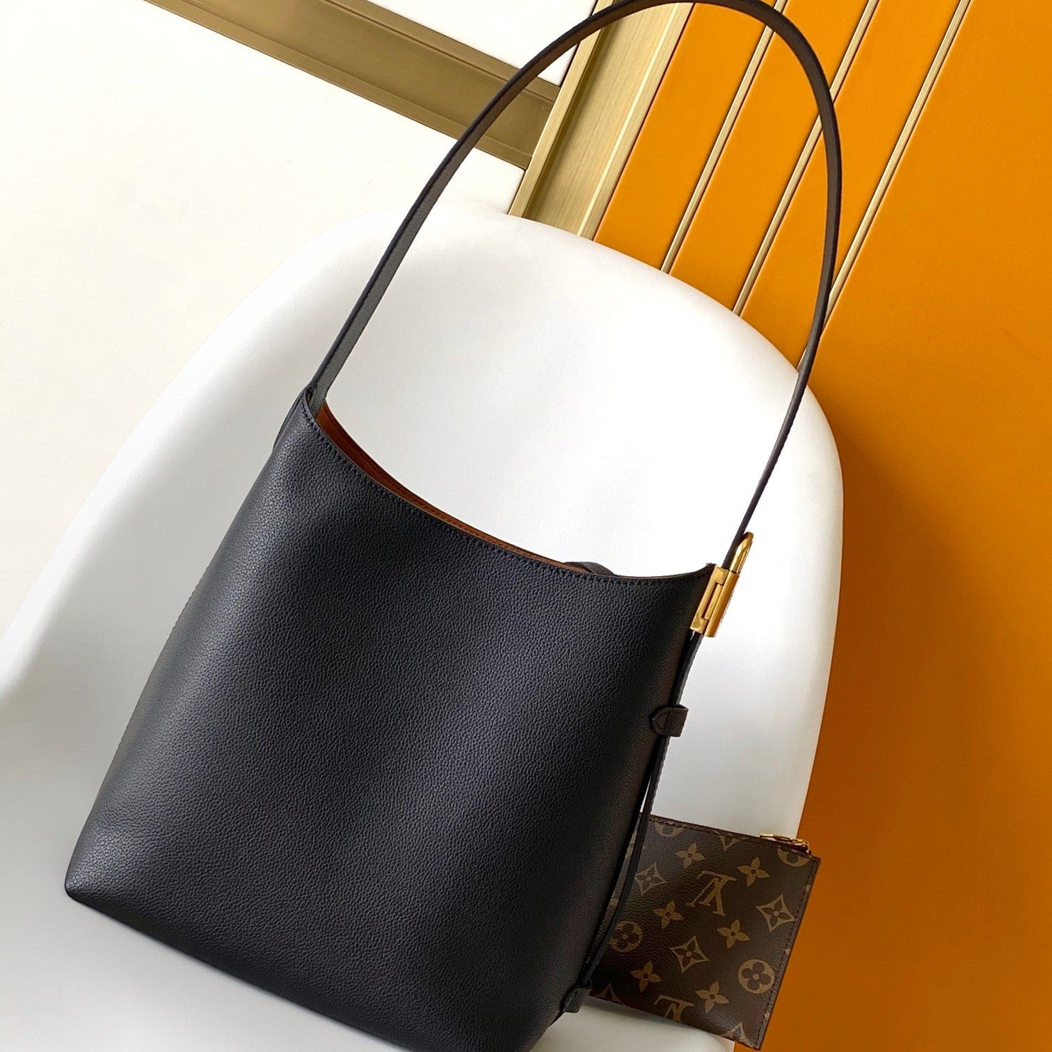 LV 25S LOW KEY HOBO BAG 28 CM IN BLACK CALFSKIN