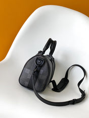LV 25S KEEPALL BANDOULIÈRE 25 BAG IN DAMOFLAGE BLACK CALFSKIN