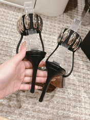 ALAIA HIGH SANDAL IN BLACK CALFSKN AND FILM WITH CRYSTAL