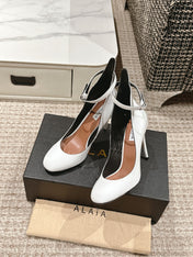 ALAIA ROUND-TOE HIGH HEELS 10 CM IN WHITE CALFSKIN