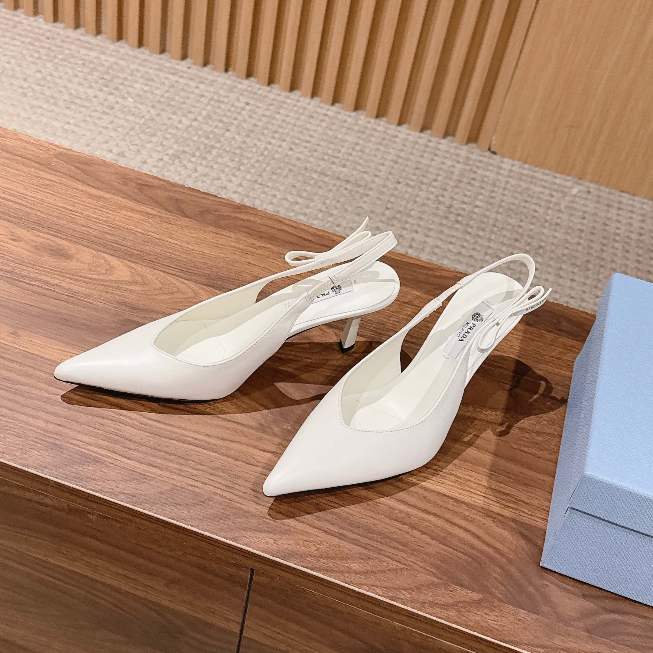 PRADA 26S SLINGBACK PUMPS IN WHITE CALFSKIN