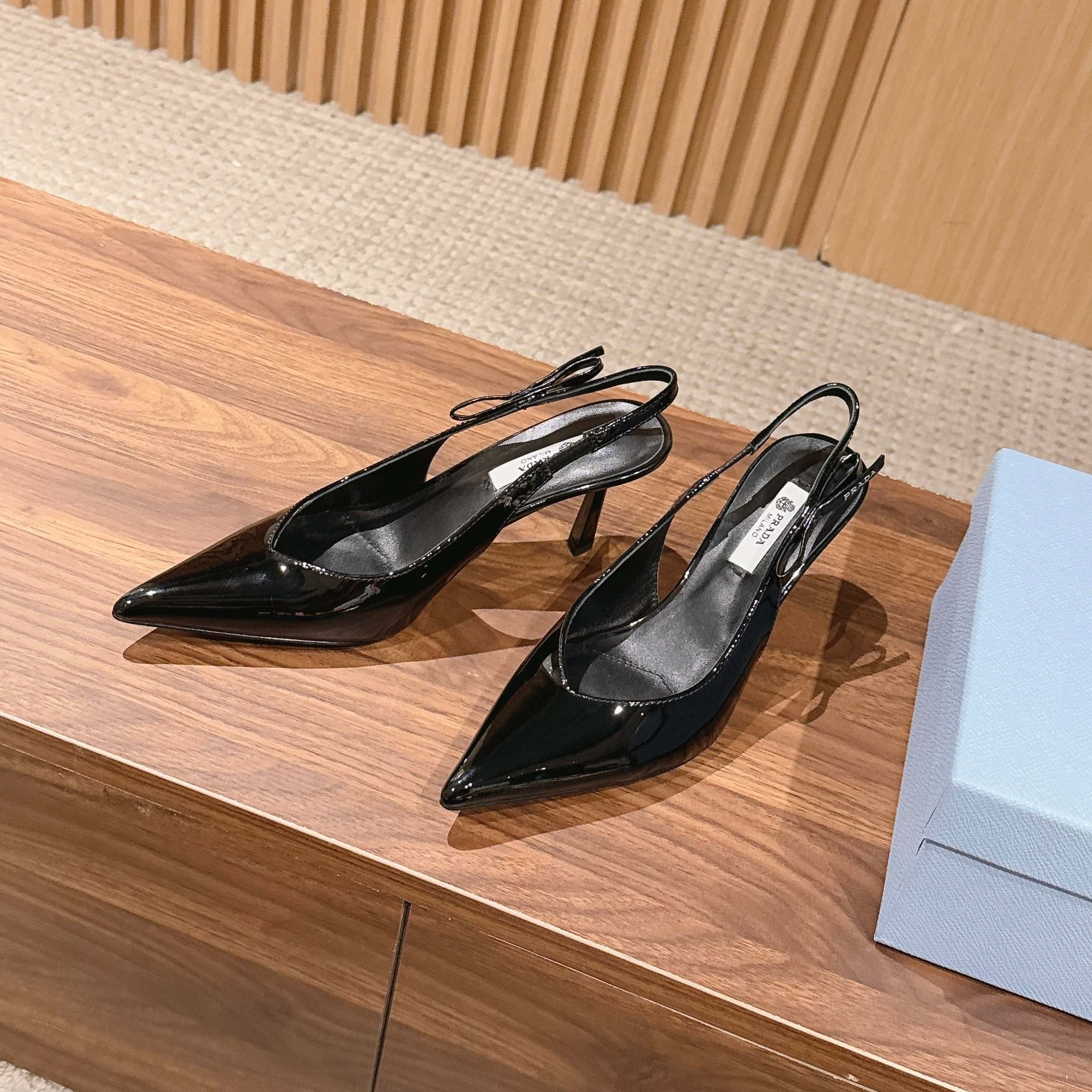 PRADA 26S SLINGBACK PUMPS IN BLACK PATENT CALFSKIN