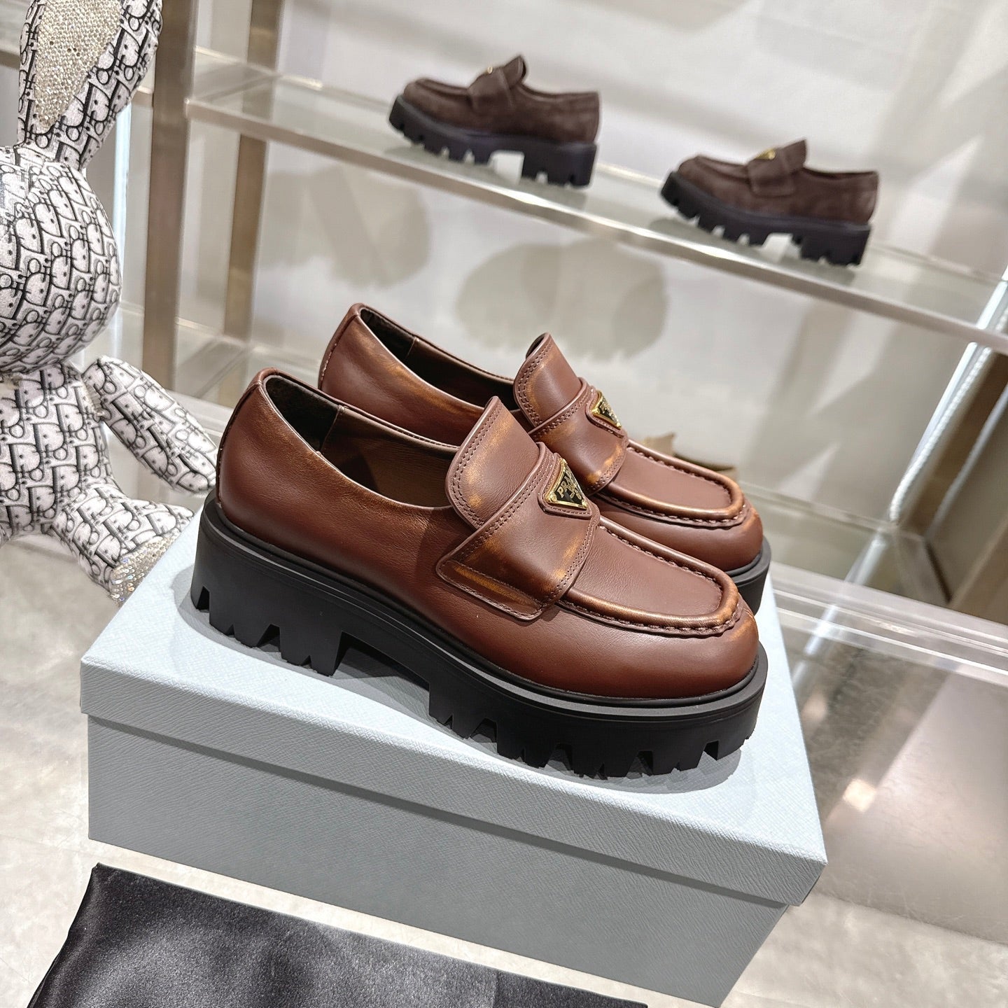 PRADA 25S THICK-SOLE LOAFERS 60 MM IN BROWN SMOOTH CALFSKIN