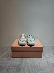 MIUMIU 26S LOW TOP SNEAKERS IN LIGHT BLUE CANVAS CRYSTAL-EMBELLISHED