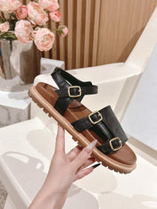 FLAT SANDALS IN BLACK TRIOMPHE EMBOSSED SMOOTH CALFSKIN