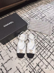 FLAT SLINGBACKS IN WHITE CALFSKIN AND BLACK FABRIC