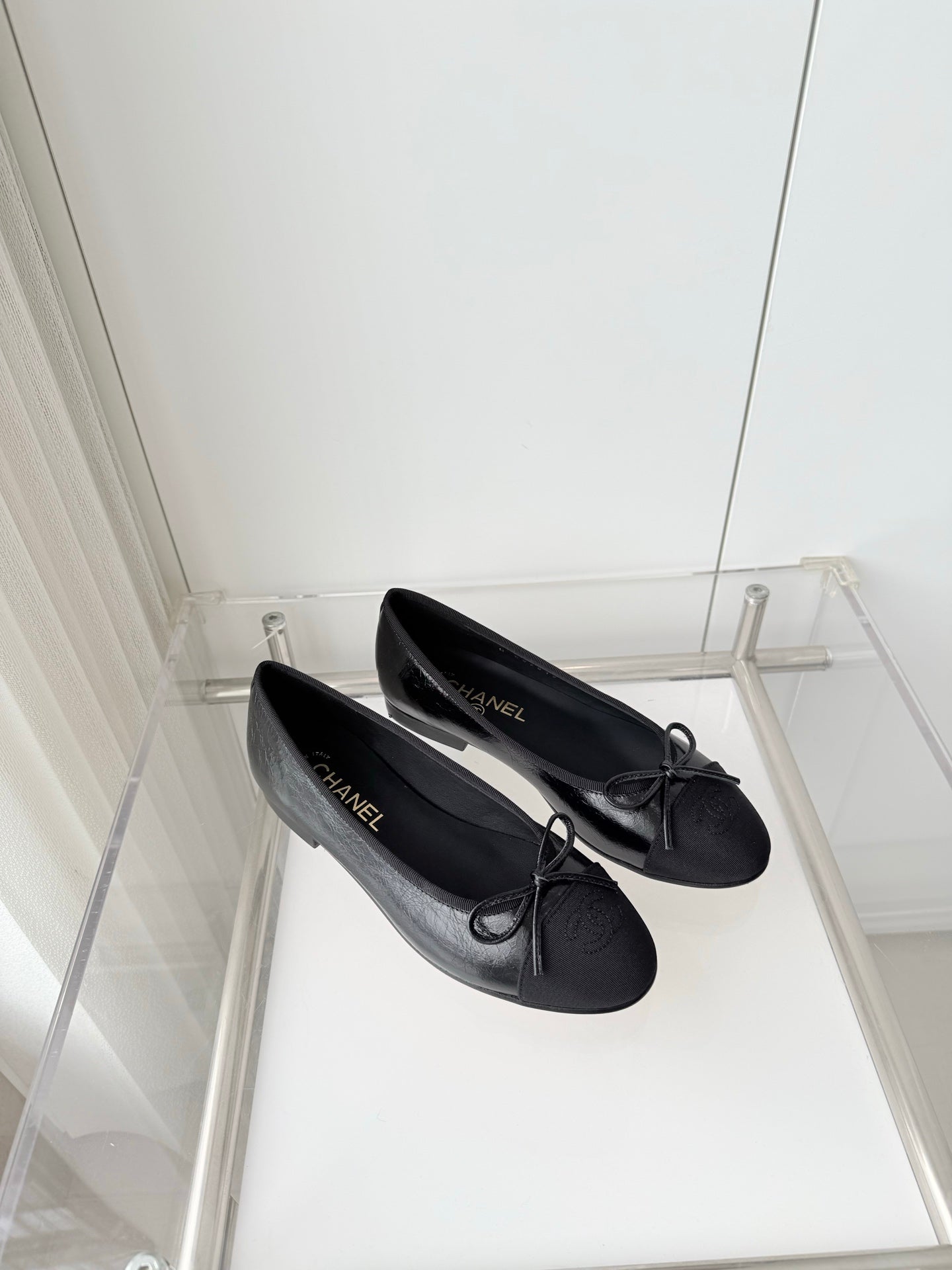 CHANEL 26S BALLET FLATS IN BLACK CALFSKIN WITH FABRIC TOE CAP AND BOW