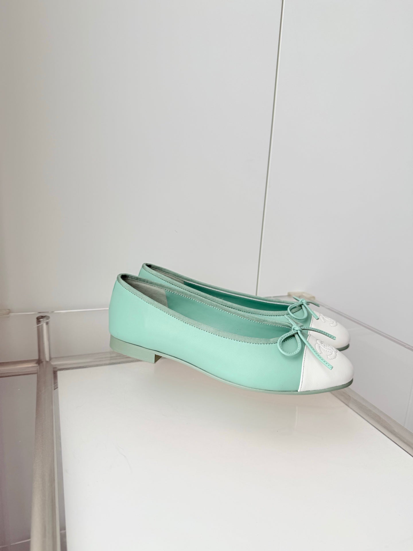 CHANEL 26S BALLET FLATS IN MINT GREEN CALFSKIN WITH WHITE TOE CAP AND BOW