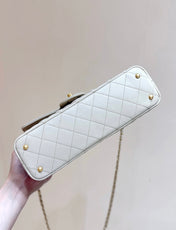 QUILTED FLAP BAG WITH HANDLE 26 IN BEIGE LAMBSKIN GOLD PLATED METAL