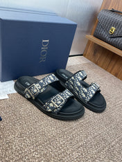 DIOR 25S DIORACT SLIDE IN DEEP BLUE CALFSKIN AND CANVAS SILVER HARDWARE