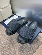 DIOR 25S ALIAS SLIDES IN BLACK CALFSKIN WITH CD OBLIQUE DARK BLUE LOGO