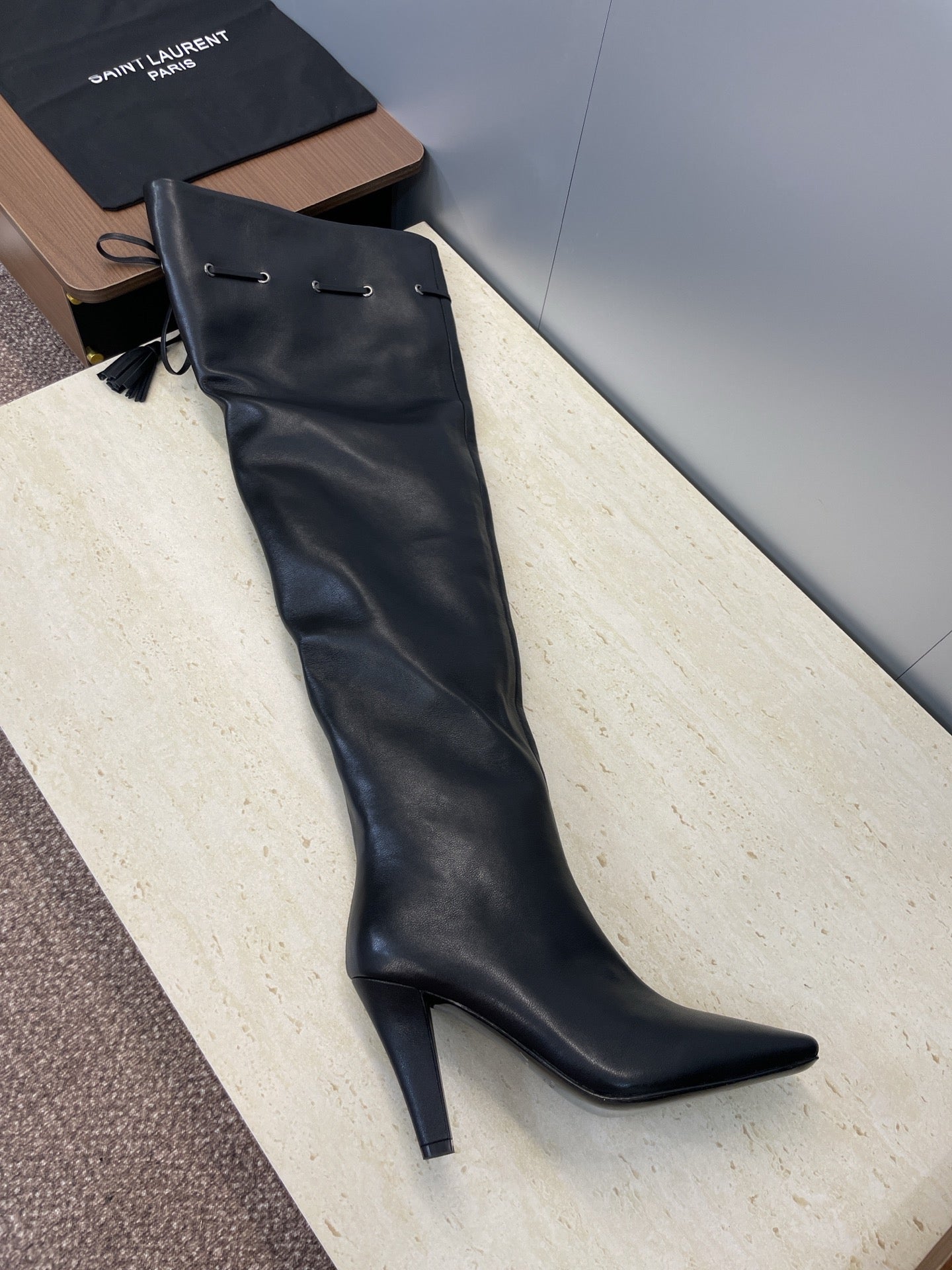 YSL 25S HIGH‑HEEL FRINGED MARTIN BOOTS 90 MM IN BLACK LAMBSKIN