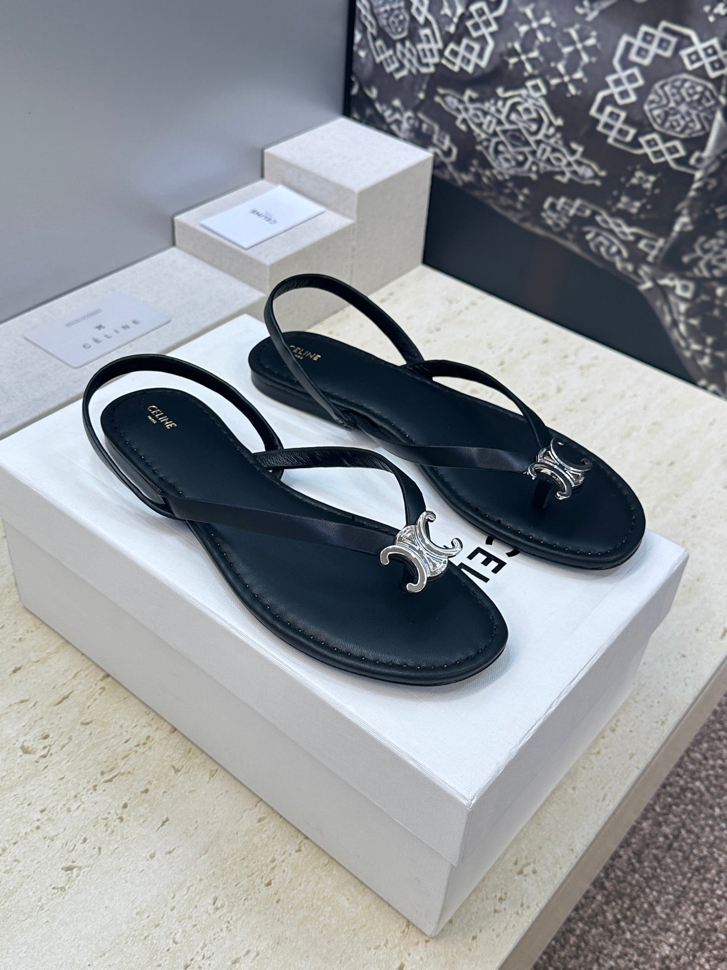 CELINE 26S THONG SANDALS IN BLACK CALFSKIN