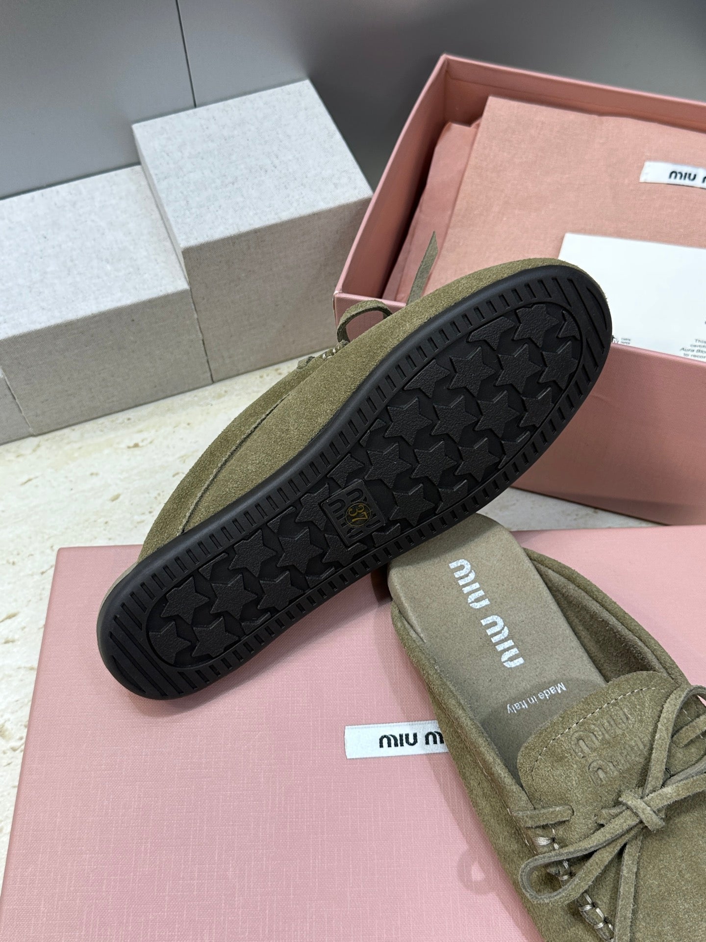 MIUMIU 26S SNEAKER MULES IN DARK OLIVE GREEN SUEDE WITH BOW