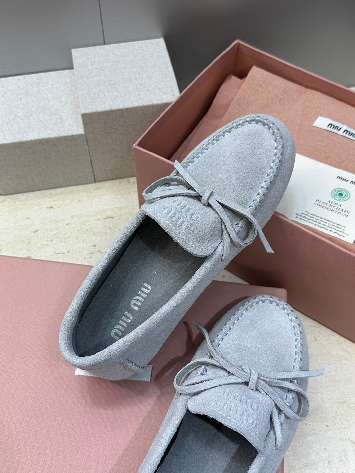 MIUMIU 26S LOAFERS IN LIGHT BLUE SUEDE WITH BOW