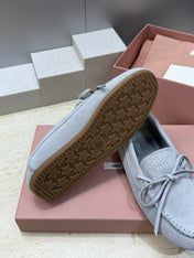 MIUMIU 26S LOAFERS IN LIGHT BLUE SUEDE WITH BOW