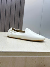 THE ROW 26S BALLET FLATS IN IVORY WHITE CALFSKIN