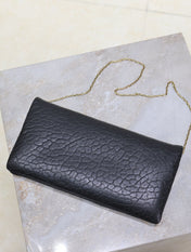CALYPSO POUCH 24 IN BLACK ELEPHANT TEXTURED LAMBSKIN GOLD LOGO