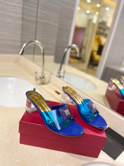 HIGH MULE 60MM IN COBALT BLUE SHEEPSKIN AND TRANSPARENT PVC