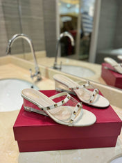 ROCKSTUD MULE SANDALS IN WHITE CALFSKIN AND TRANSPARENT PVC FILM