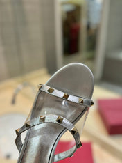 ROCKSTUD MULE SANDALS IN SILVER CALFSKIN AND TRANSPARENT PVC FILM