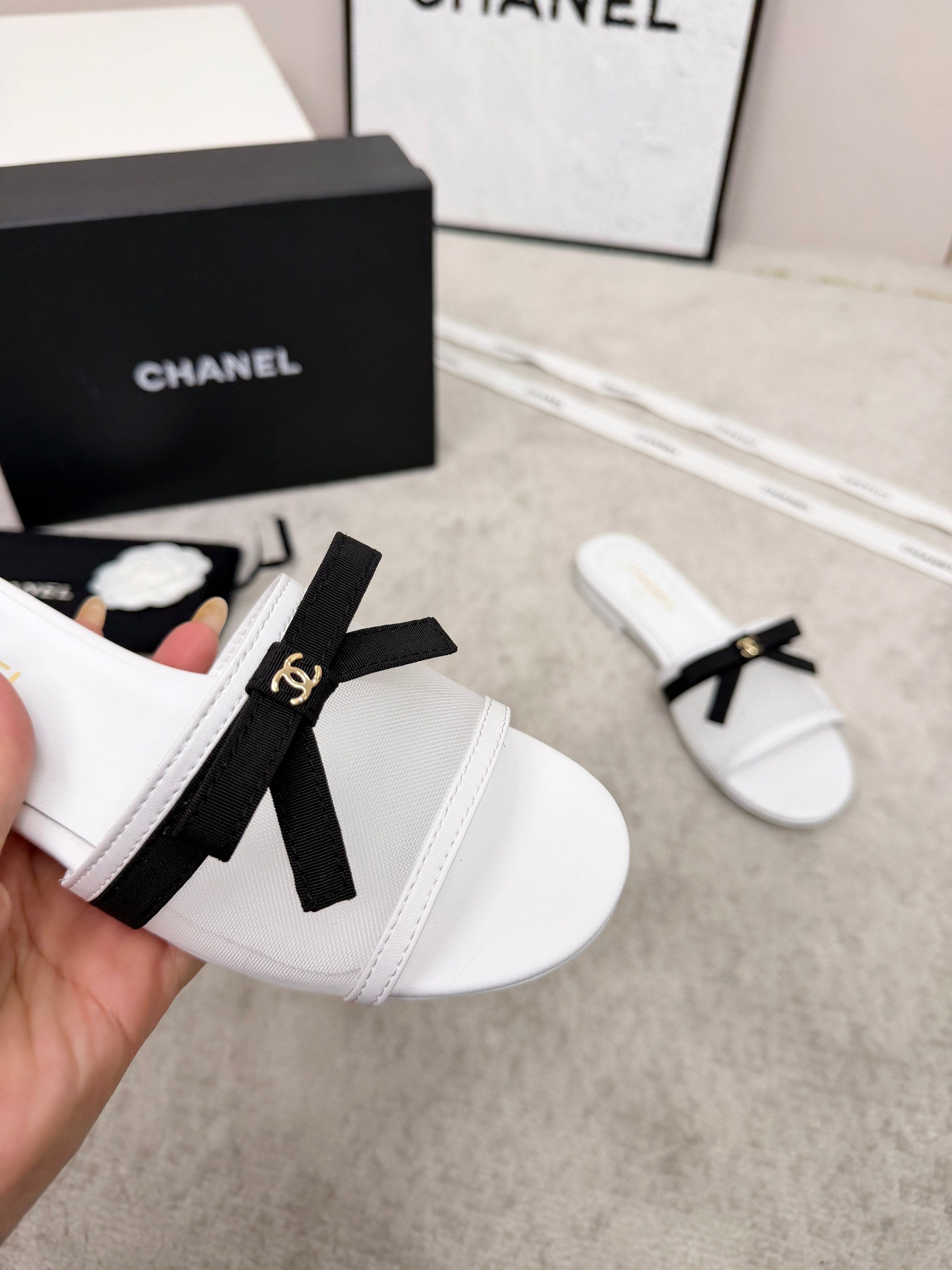 CHANEL 26S SLIDE SANDALS IN WHITE MESH AND CALFSKIN WITH BLACK RIBBON