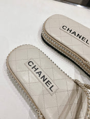 WOVEN STRAP SLIPPERS IN WHITE LAMBSKIN